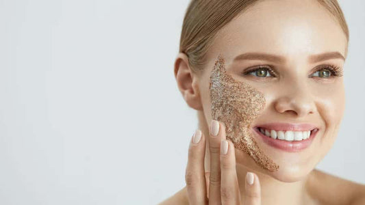 Woman putting a facial mask on her face.